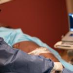 Doctor who is treating varicose veins