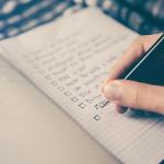 person making a checklist
