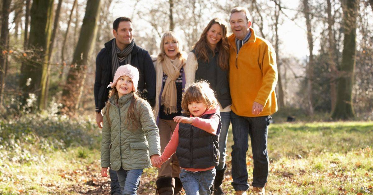 family going for a walk during autumn