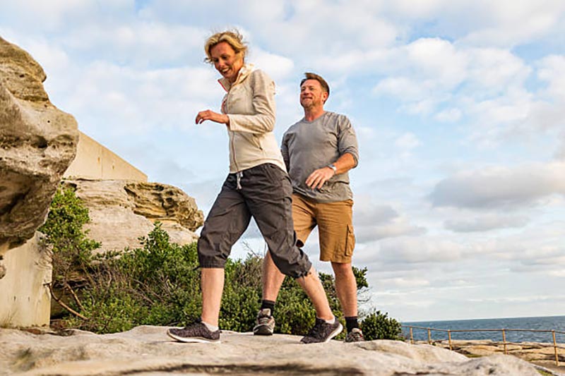 Couple hiking and showing off legs