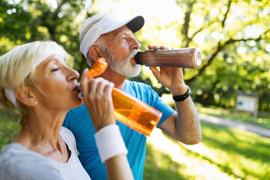 Older couple drinking water